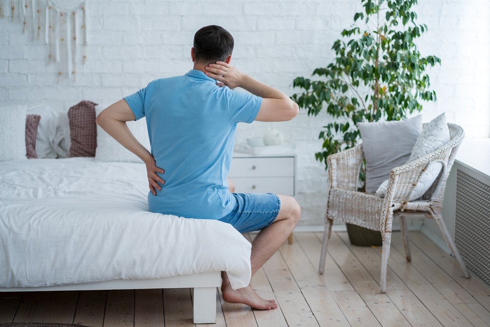 Lumbar,And,Cervical,Spine,Hernia,,Man,With,Back,Pain,At